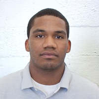 Official State Department example of an unacceptable passport photo with a textured background